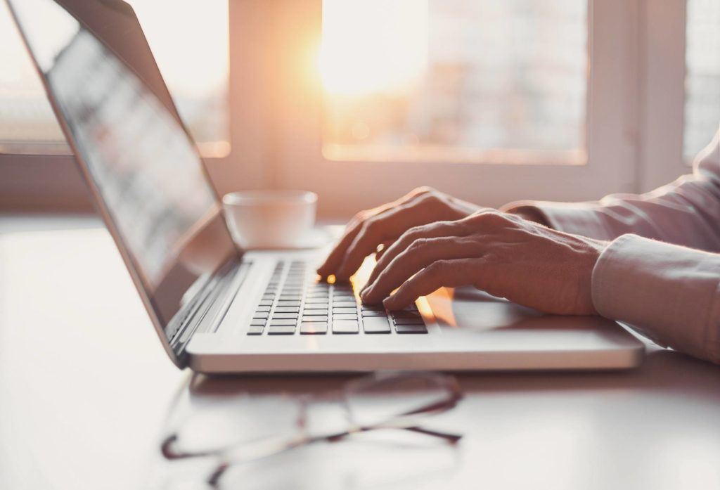 Man using his laptop computer