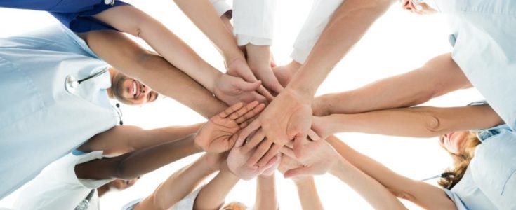Medical Team Putting Hands Together