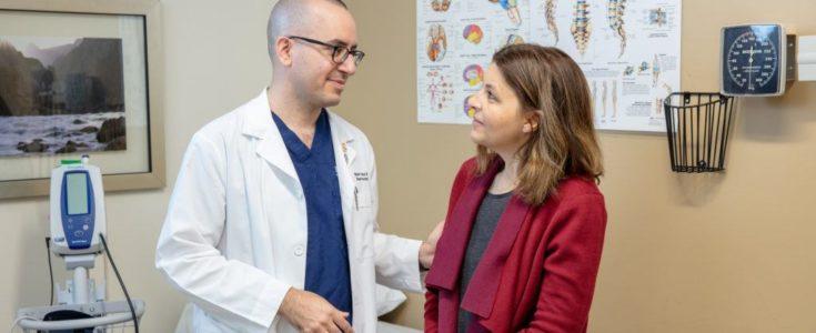 Dr. Sanai talking to patient