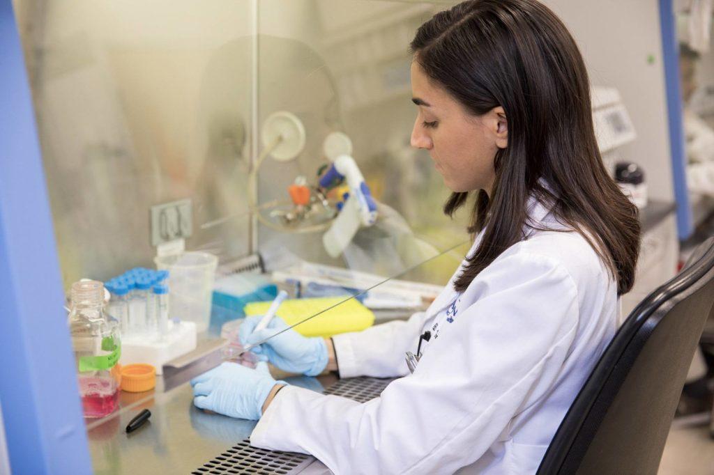 Female lab tech working on a project