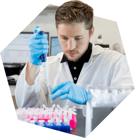 Researcher filling vials
