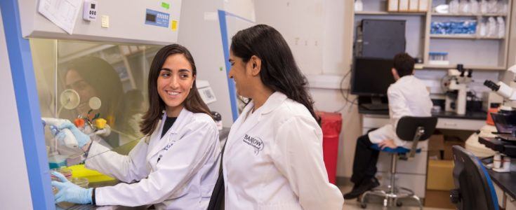 Women laughing in lab